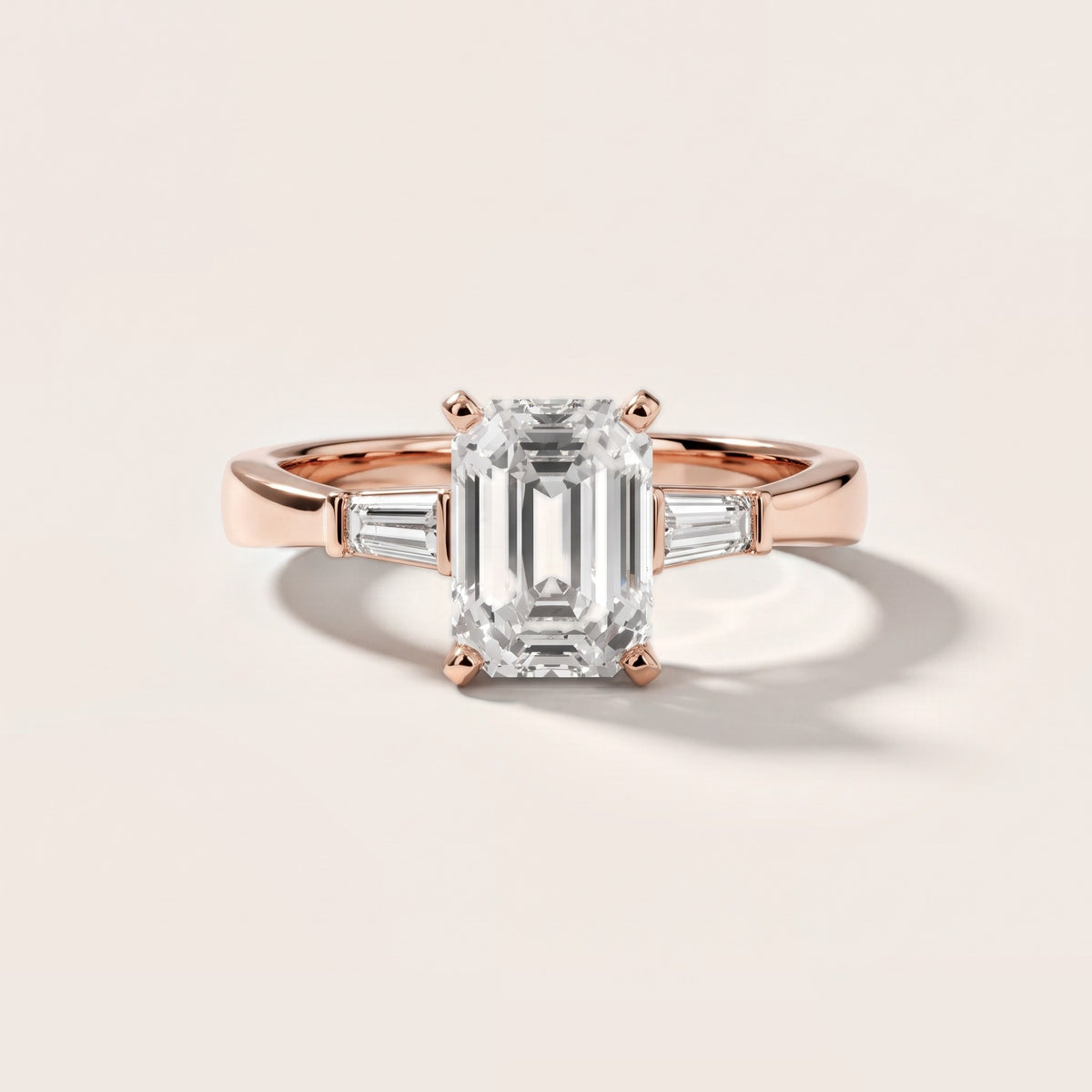 Jacinta Baguette Three-Stone Emerald Diamond Engagement Ring in Rose Gold - front.jpg