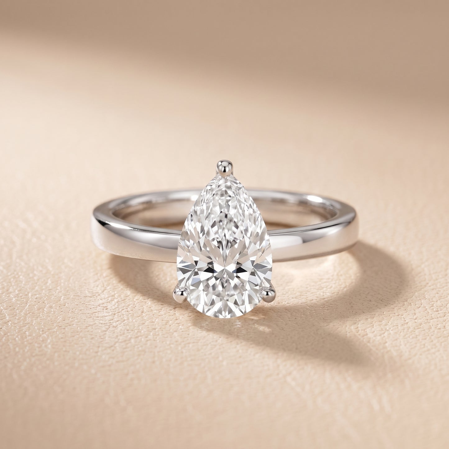 Delia Solitaire Pear Diamond Engagement Ring in Platinum - front.jpg