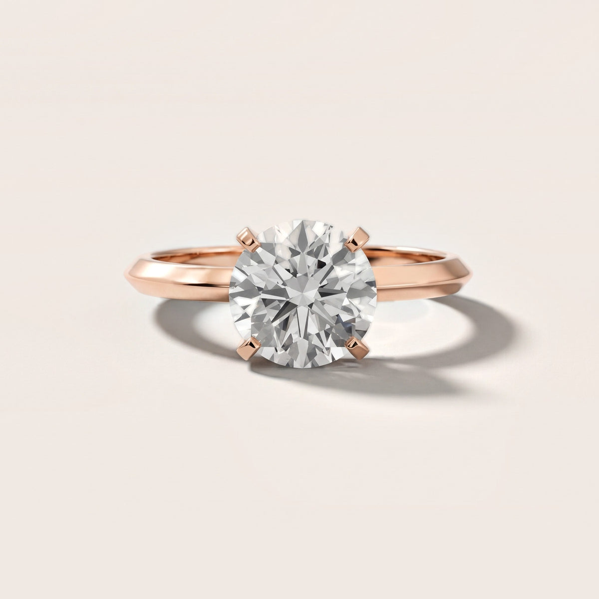Verity Solitaire Knife Edge Round Diamond Engagement Ring in Rose Gold - front.jpg