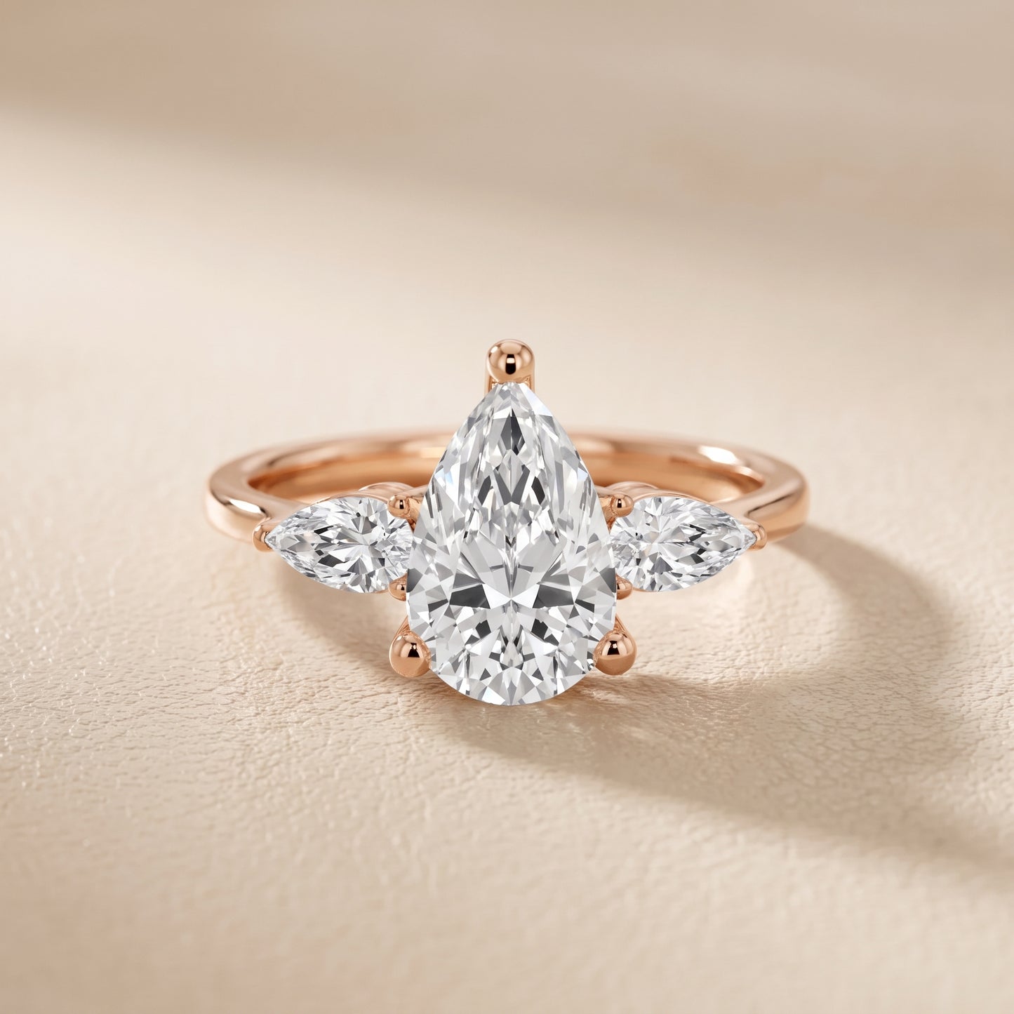 Faye Three-Stone Trellis Pear Diamond Ring in Rose Gold - front.jpg