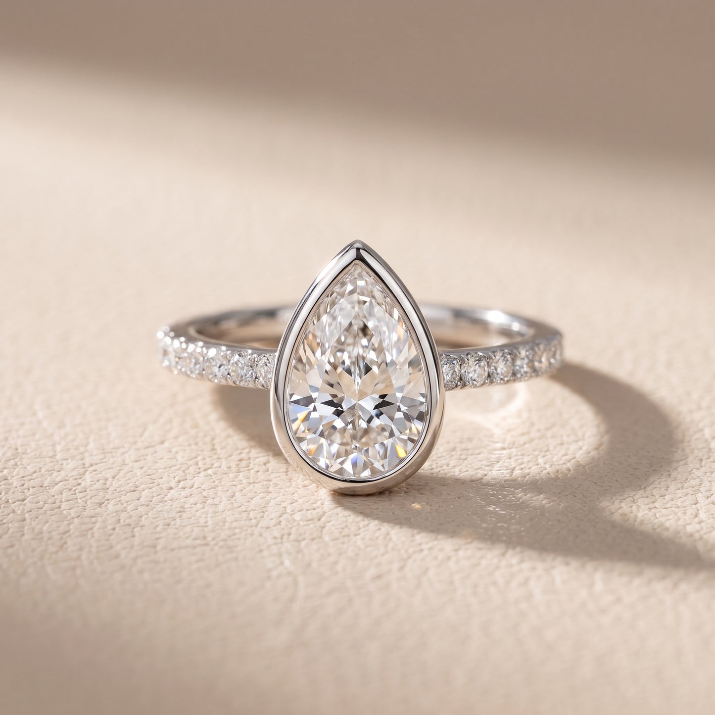 Cora Bezel Pavé Pear Diamond Ring in White Gold - front.jpg