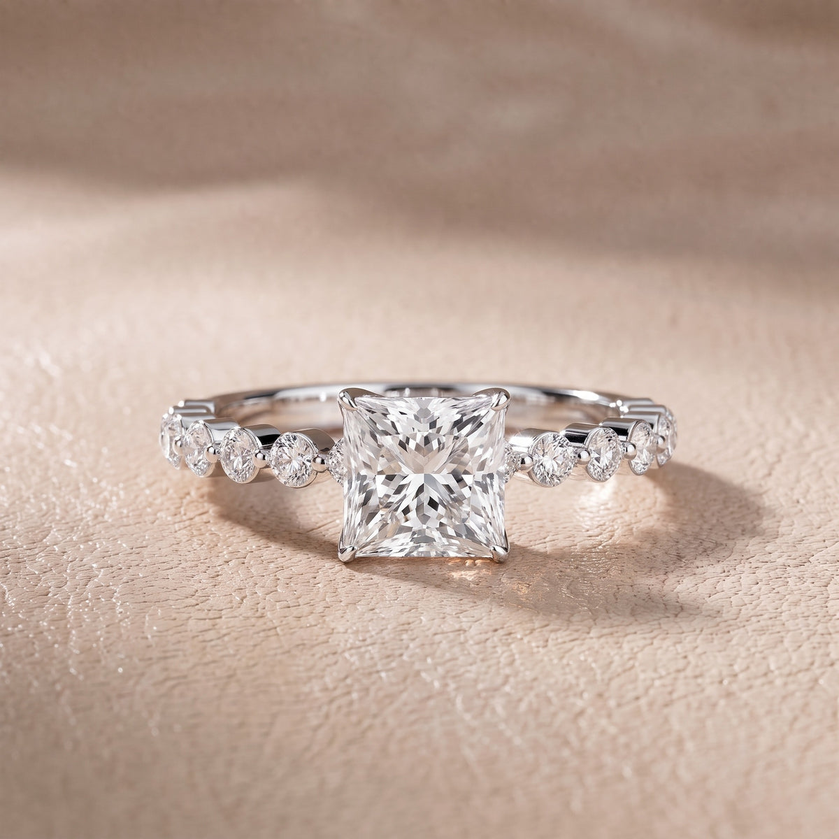 Eleanor Majesty Side Stone Princess Diamond Engagement Ring in Platinum - front.jpg