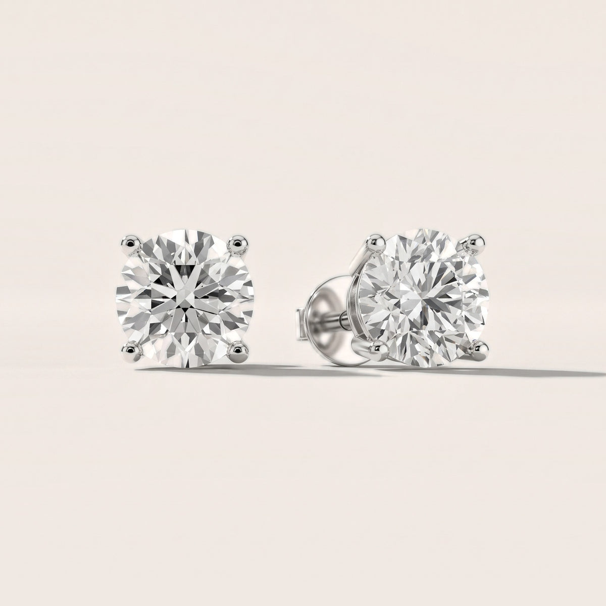 Four Prong Round Diamond Stud Earrings in Platinum [studio-20261024]