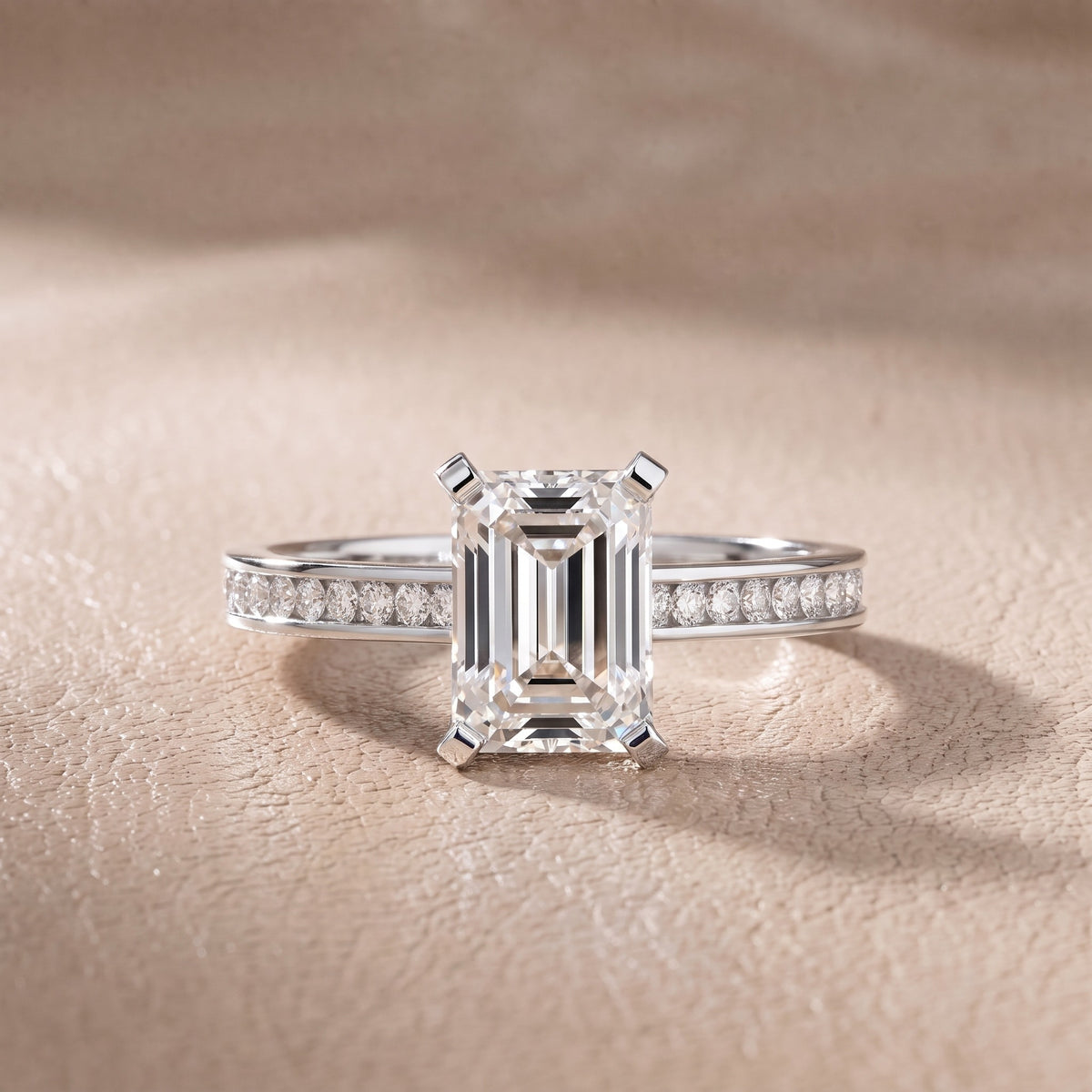 Tessa Solitaire Channel Set Emerald Diamond Engagement Ring in Platinum - front.jpg