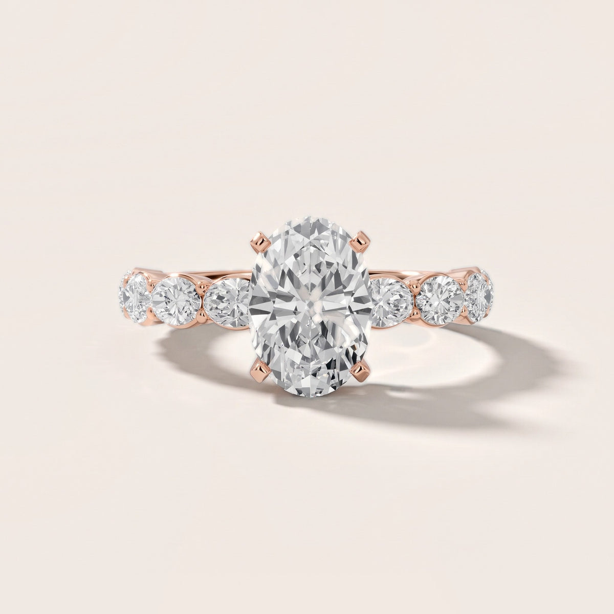 Isobel East-West Pavé Oval Diamond Engagement Ring in Rose Gold - front.jpg