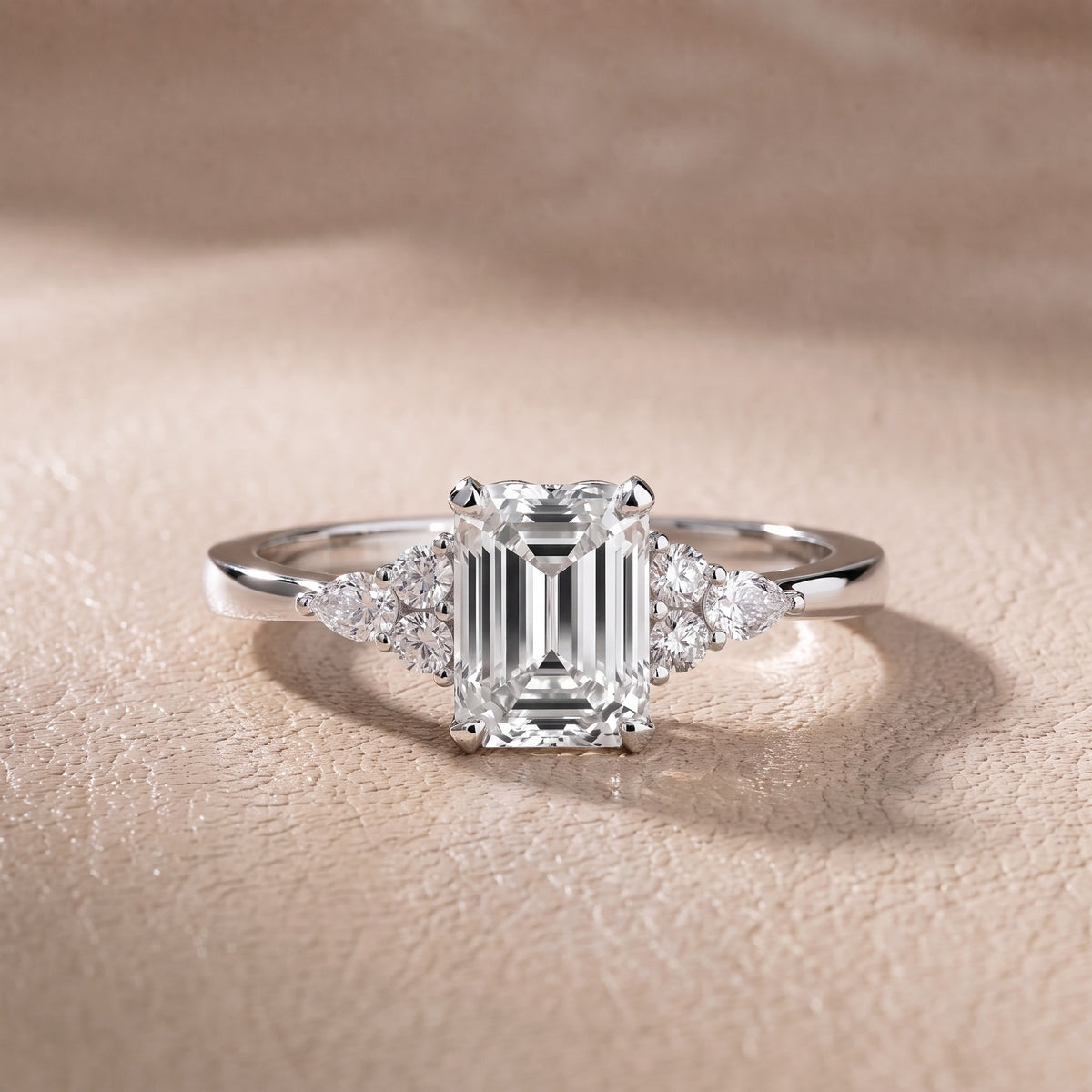 Amelia Three Stone Emerald Diamond Engagement Ring in White Gold - front.jpg