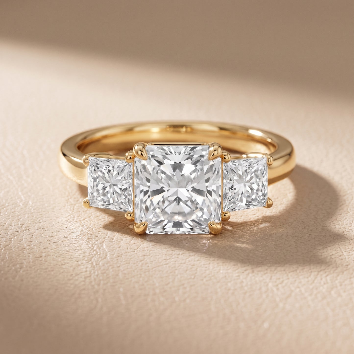 Sienna Three-Stone Radiant Diamond Ring in Yellow Gold - front.jpg
