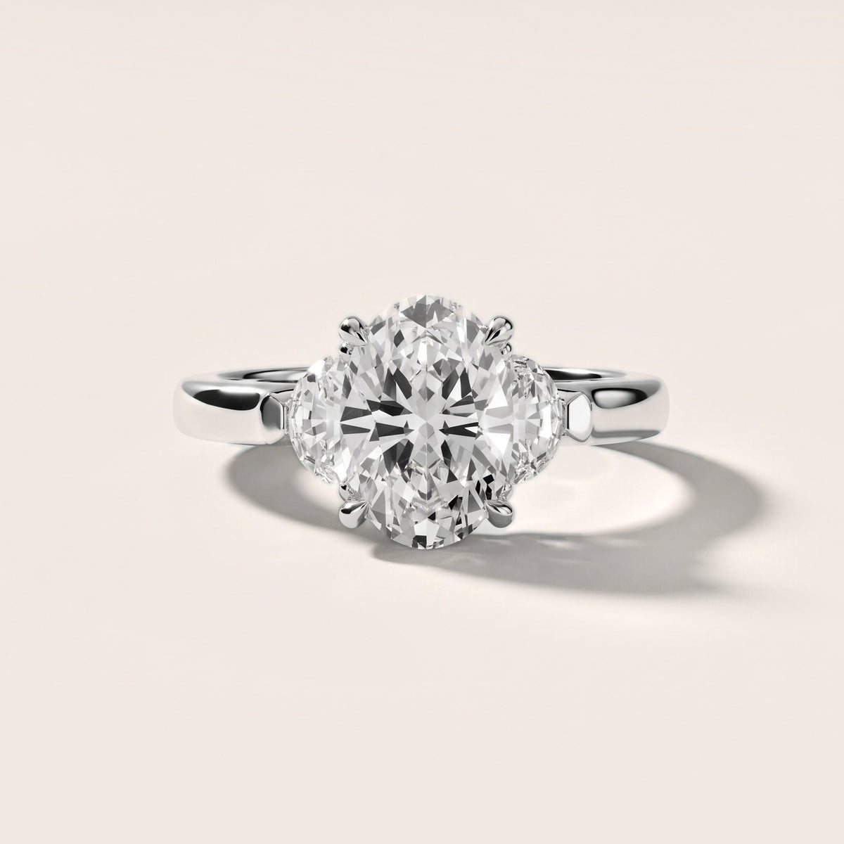 Hilary Half-Moon Three-Stone Oval Diamond Engagement Ring in Silver - front.jpg