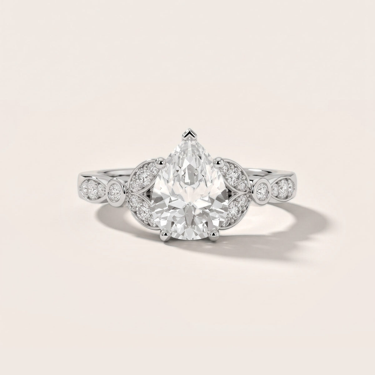 Polly Floral Cluster Pear Diamond Engagement Ring in White Gold - front.jpg