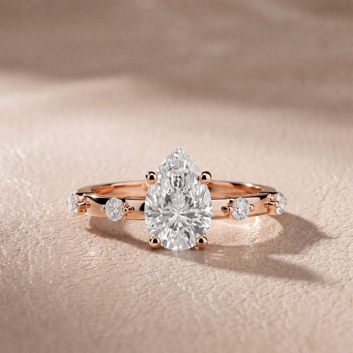 Elena Radiance Solitaire Pear Diamond Engagement Ring in Rose Gold - front.jpg