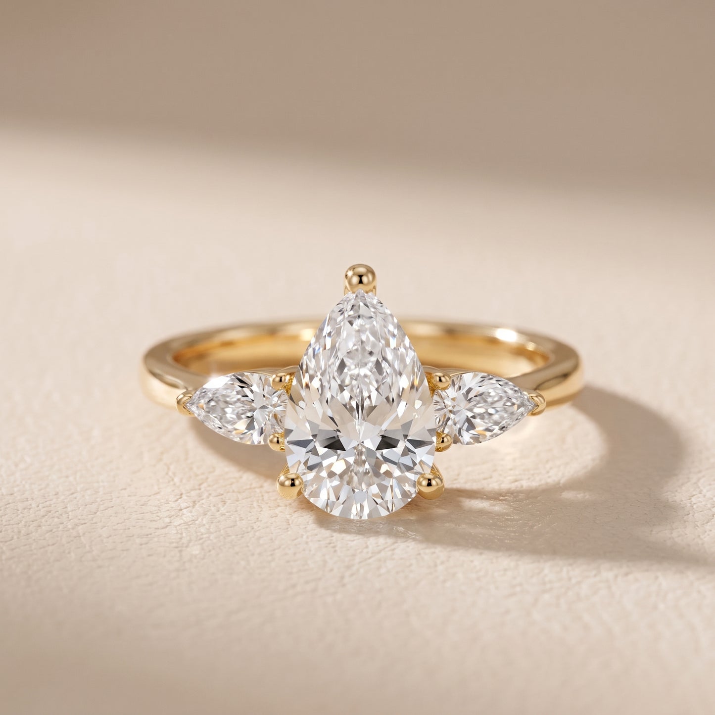 Faye Three-Stone Trellis Pear Diamond Ring in Yellow Gold - front.jpg
