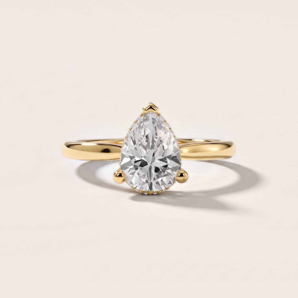 Hyacinth Hidden Halo Cathedral Pear Diamond Engagement Ring in Yellow Gold - front.jpg