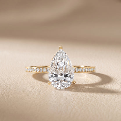 Naia Hidden Halo Pear Diamond Ring in Yellow Gold - front.jpg