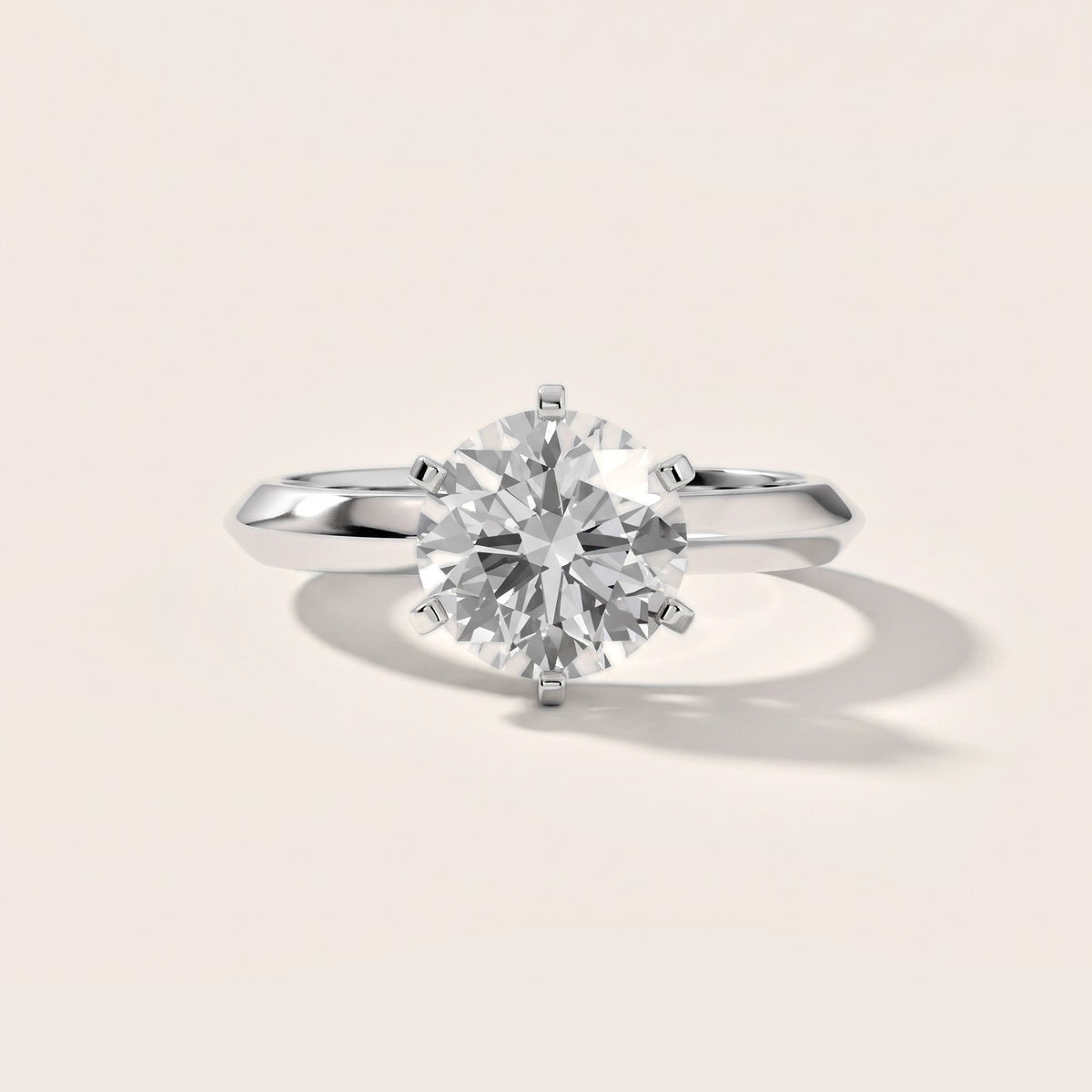 Hailey Solitaire Knife Edge Round Diamond Engagement Ring in Platinum - front.jpg