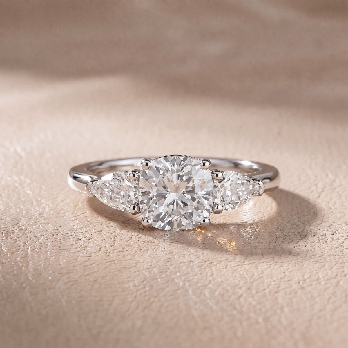 Sophia Three-Stone Cushion Diamond Engagement Ring in Platinum - front.jpg