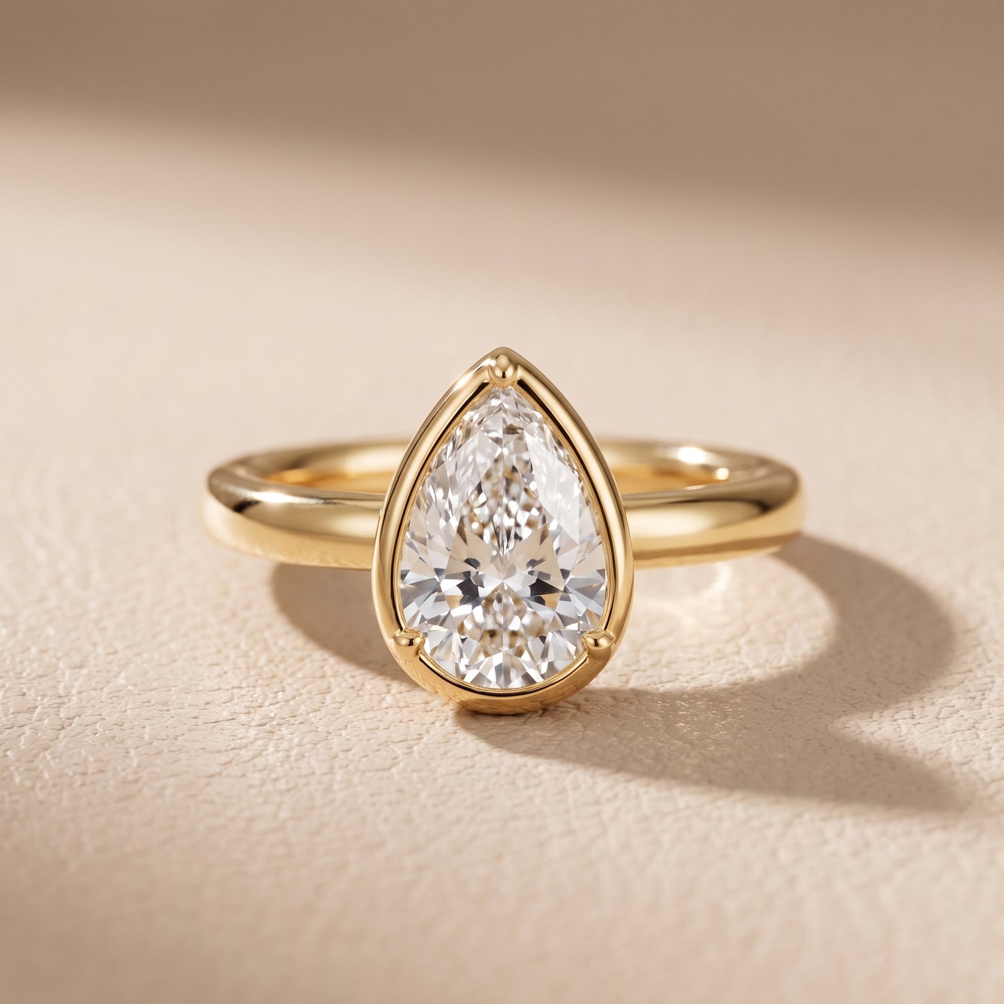 Alina Bezel Solitaire Pear Diamond Ring in Yellow Gold - front.jpg