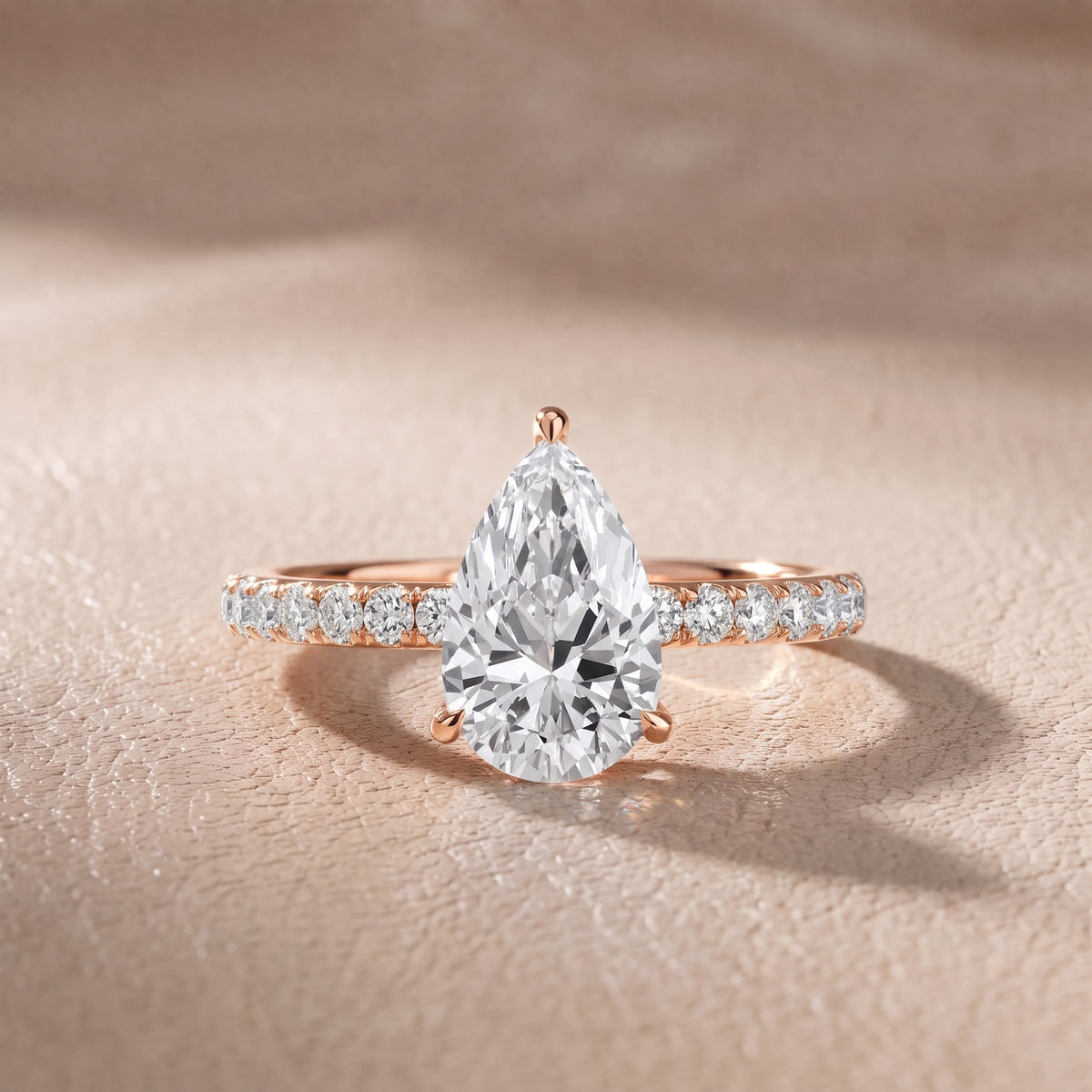 Thea Hidden Halo Pavé Pear Diamond Engagement Ring in Rose Gold - front.jpg