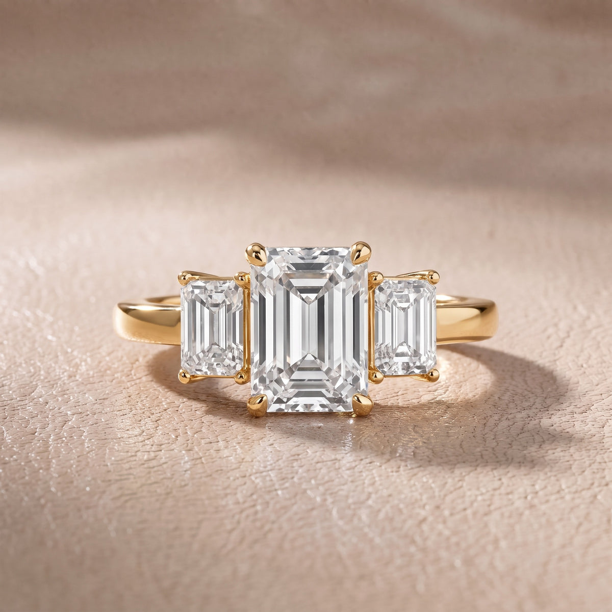 Zoe Three-Stone Emerald Diamond Engagement Ring in Yellow Gold - front.jpg