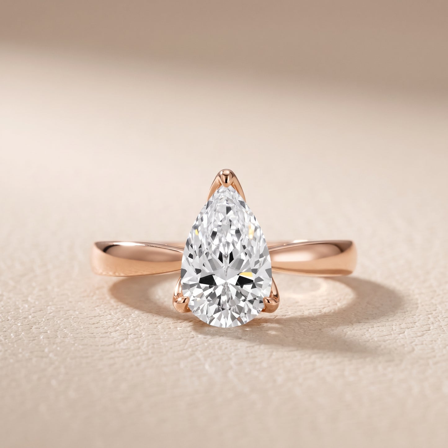 Lucia Solitaire Six-Prong Pear Diamond Engagement Ring in Rose Gold - front.jpg