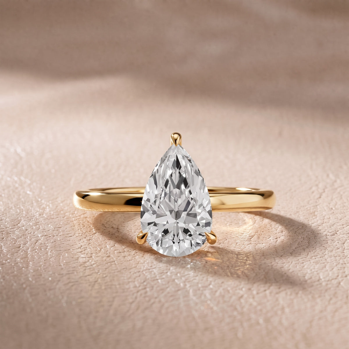 Nadia Petite Solitaire Pear Diamond Engagement Ring in Yellow Gold - front.jpg