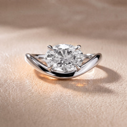 Katherine East-West Bypass Oval Diamond Engagement Ring in Platinum - front.jpg