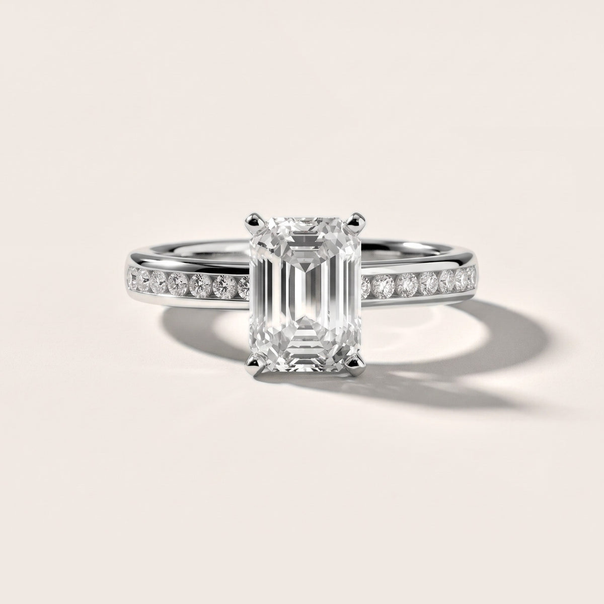 Corona Channel Set Emerald Diamond Engagement Ring in White Gold - front.jpg