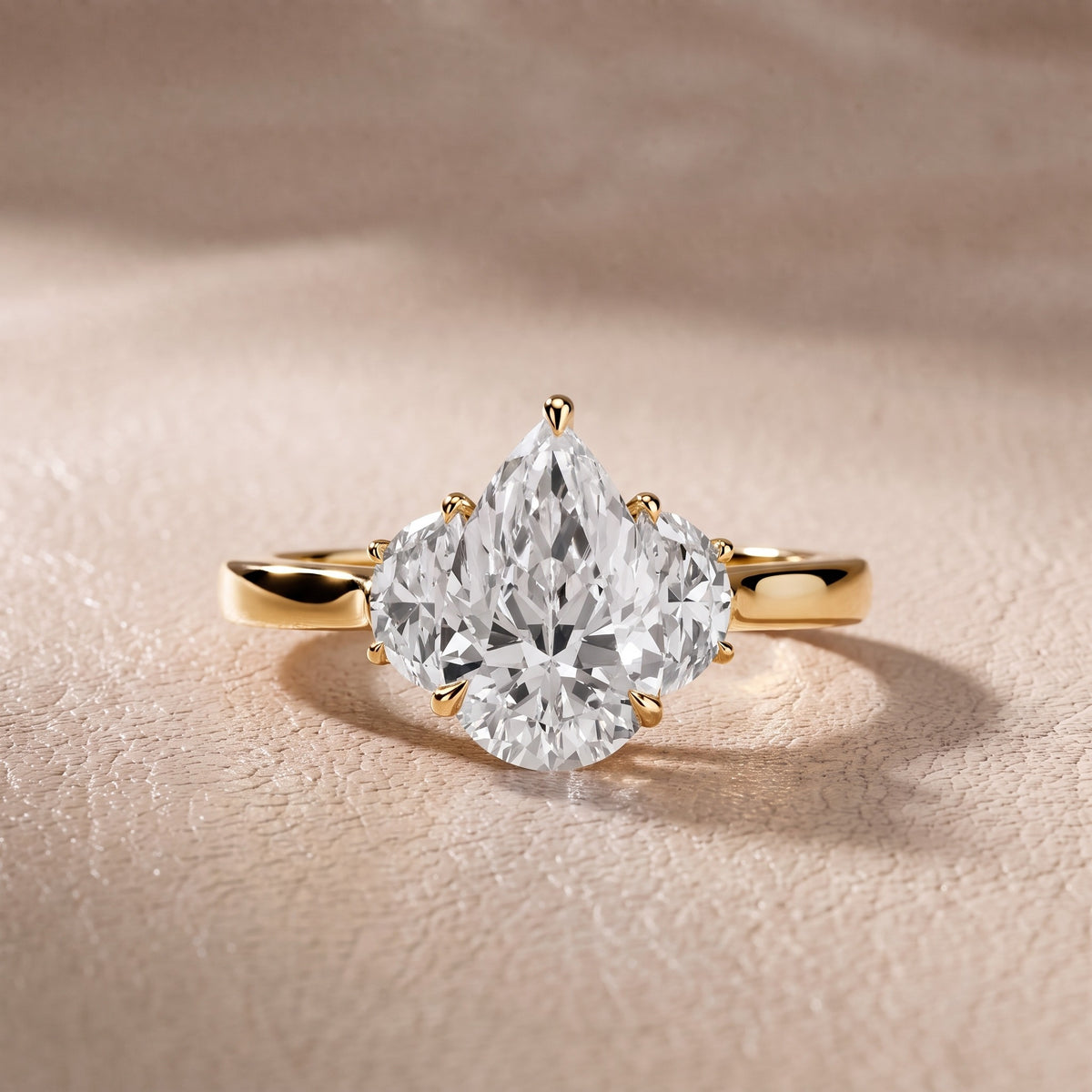 Romy Three-Stone Pear Diamond Engagement Ring in Yellow Gold - front.jpg