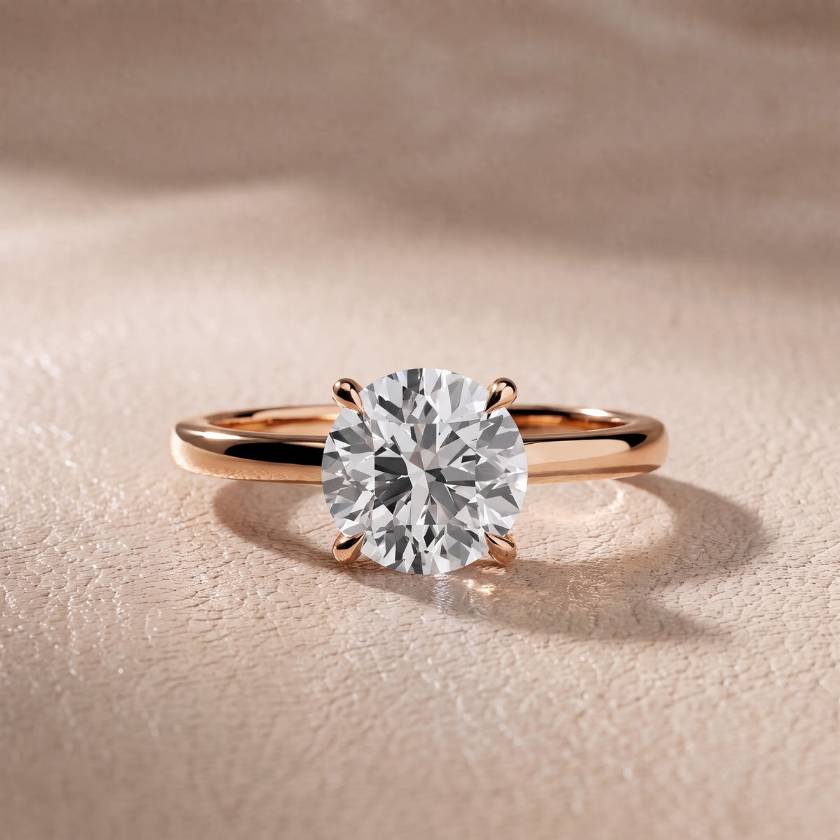 Nadia Petite Solitaire Round Diamond Engagement Ring in Rose Gold - front.jpg