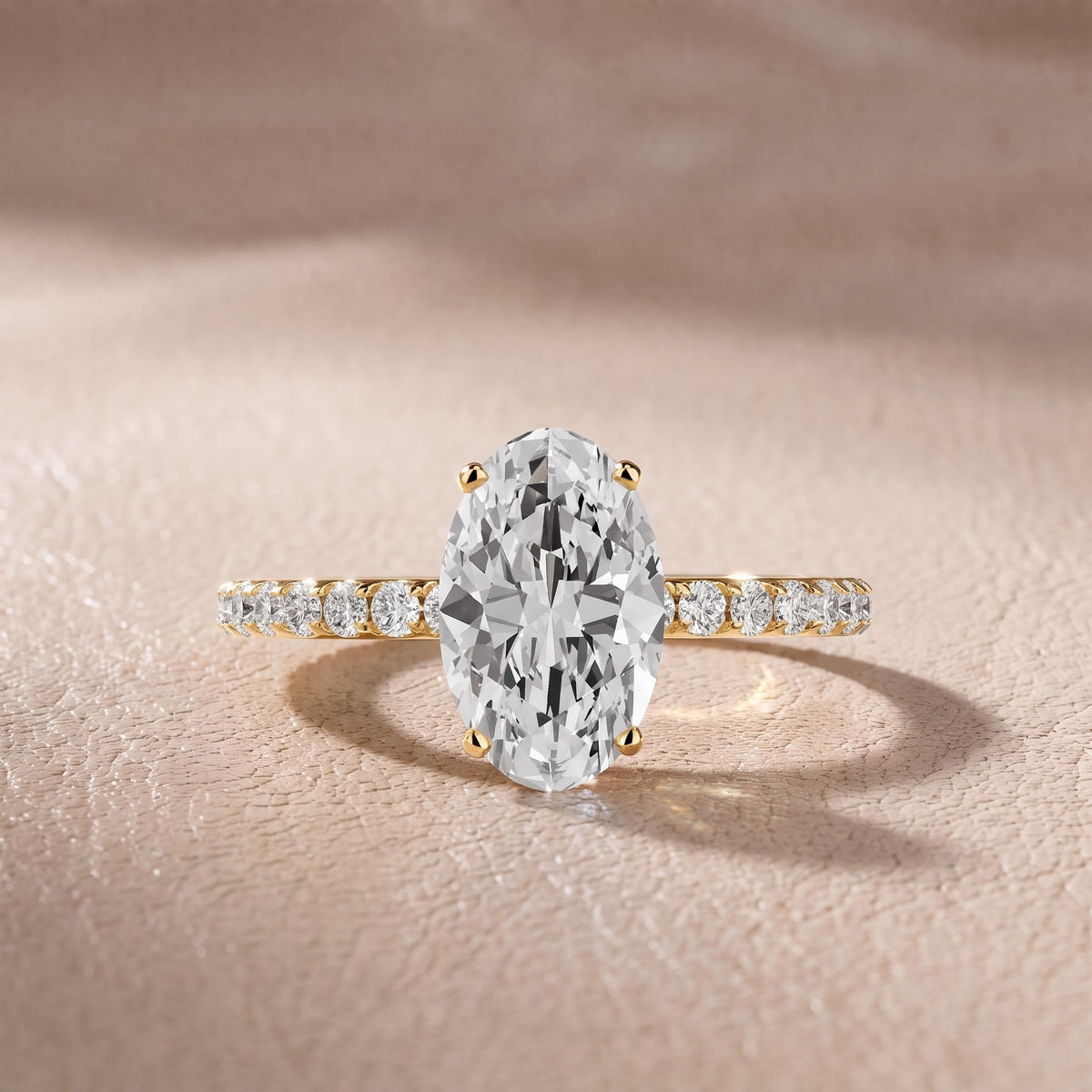 Juna French Pavé Solitaire Oval Diamond Engagement Ring in Yellow Gold - front.jpg