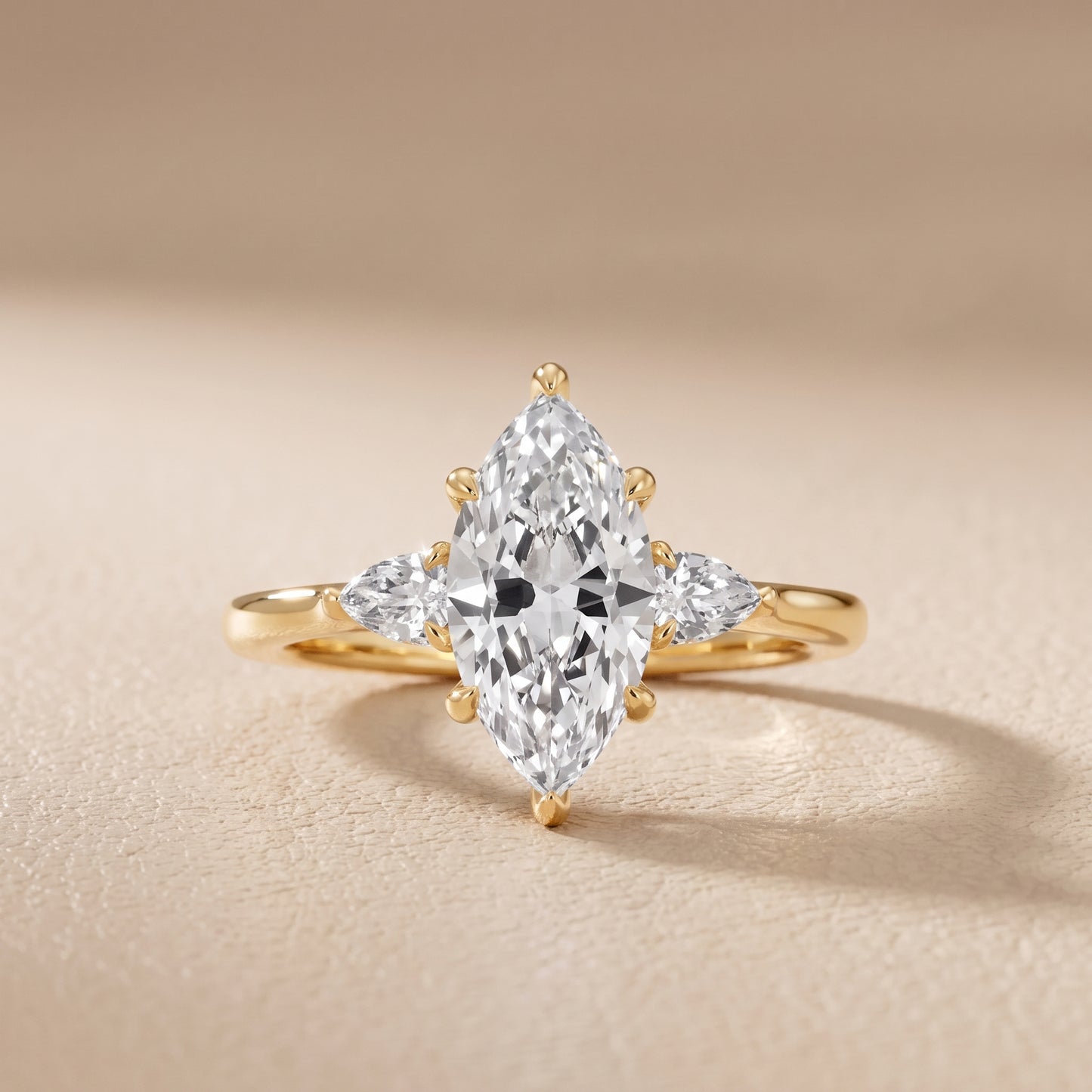 Leila Three-Stone Marquise Diamond Engagement Ring in Yellow Gold - front.jpg