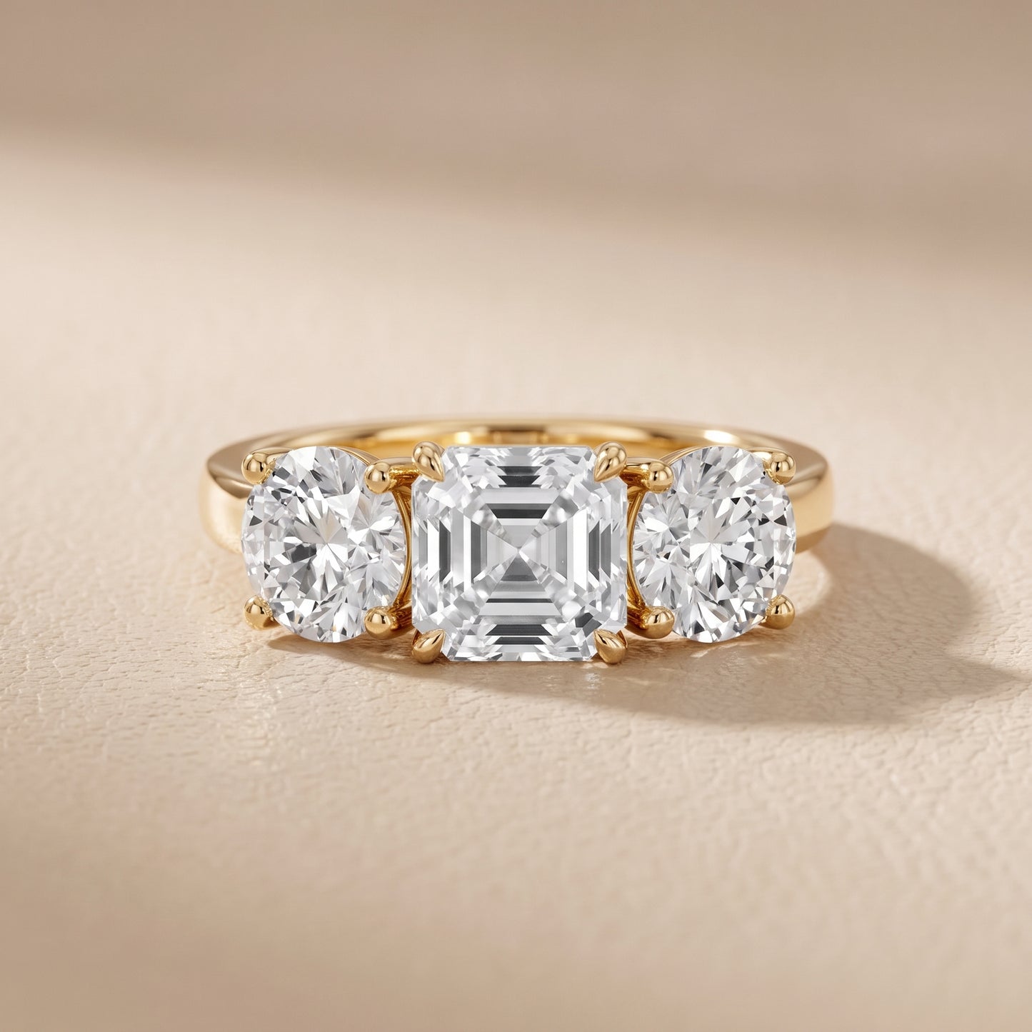 Esme Three-Stone Tapered Asscher Diamond Ring in Yellow Gold - front.jpg