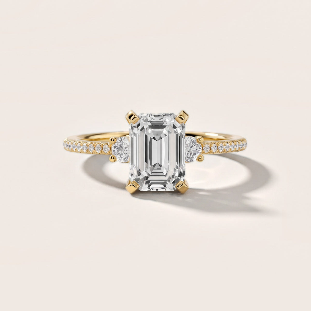 Nerissa Three-Stone Micropavé Emerald Diamond Engagement Ring in Yellow Gold - front.jpg