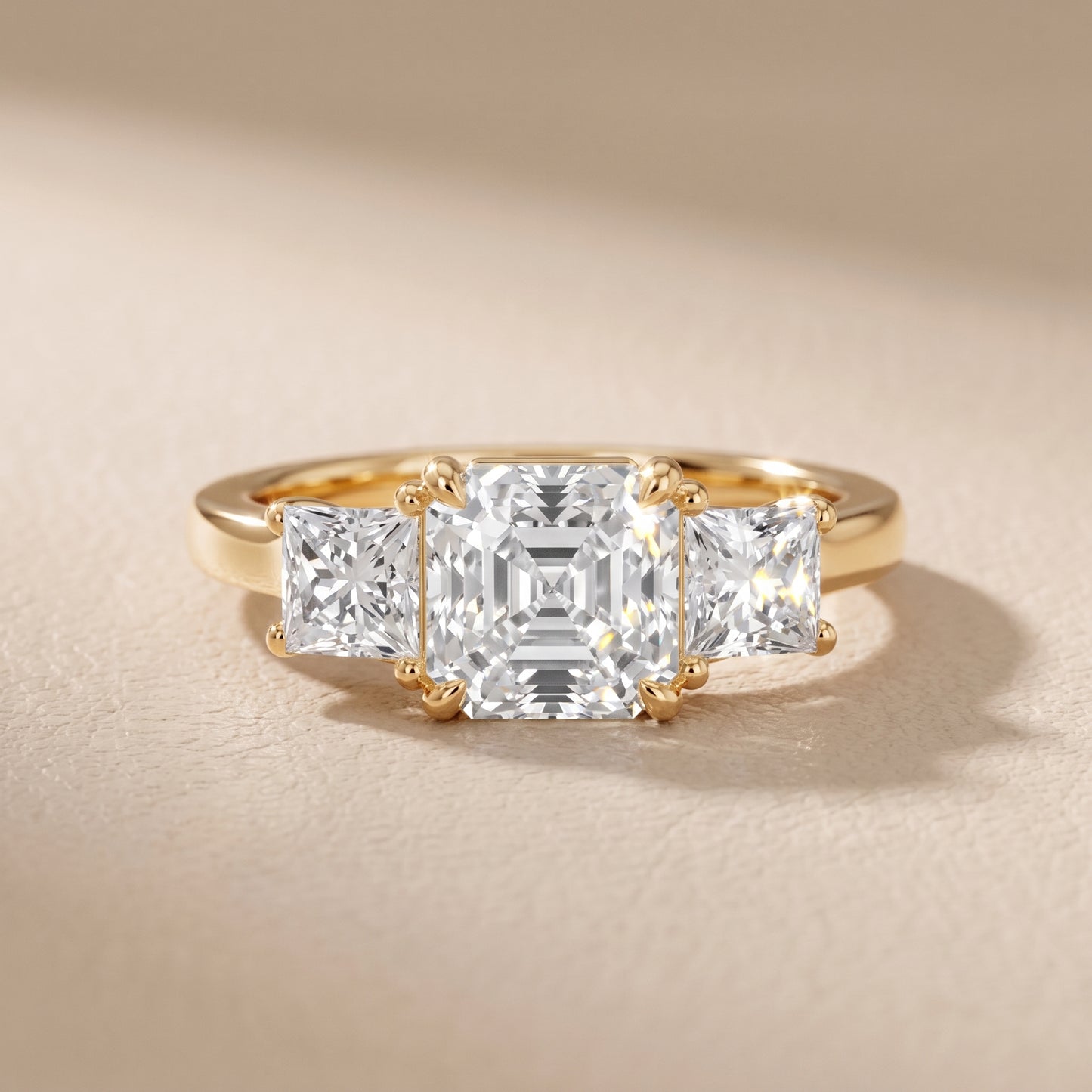 Sienna Three-Stone Asscher Diamond Ring in Yellow Gold - front.jpg