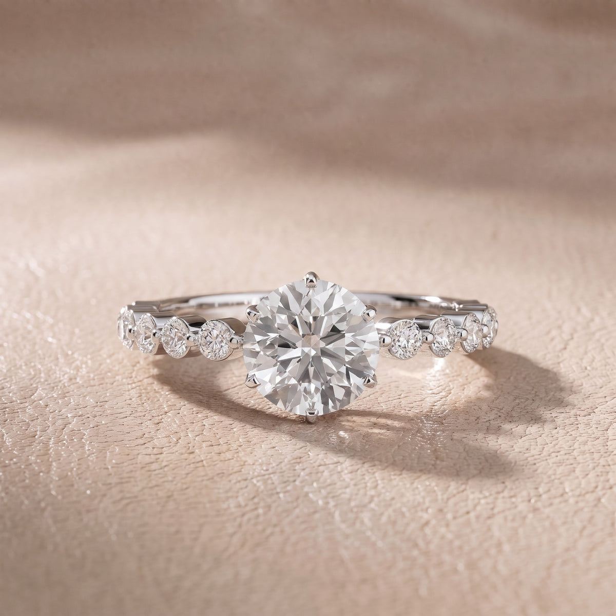 Eleanor Majesty Side Stone Round Diamond Engagement Ring in Platinum - front.jpg