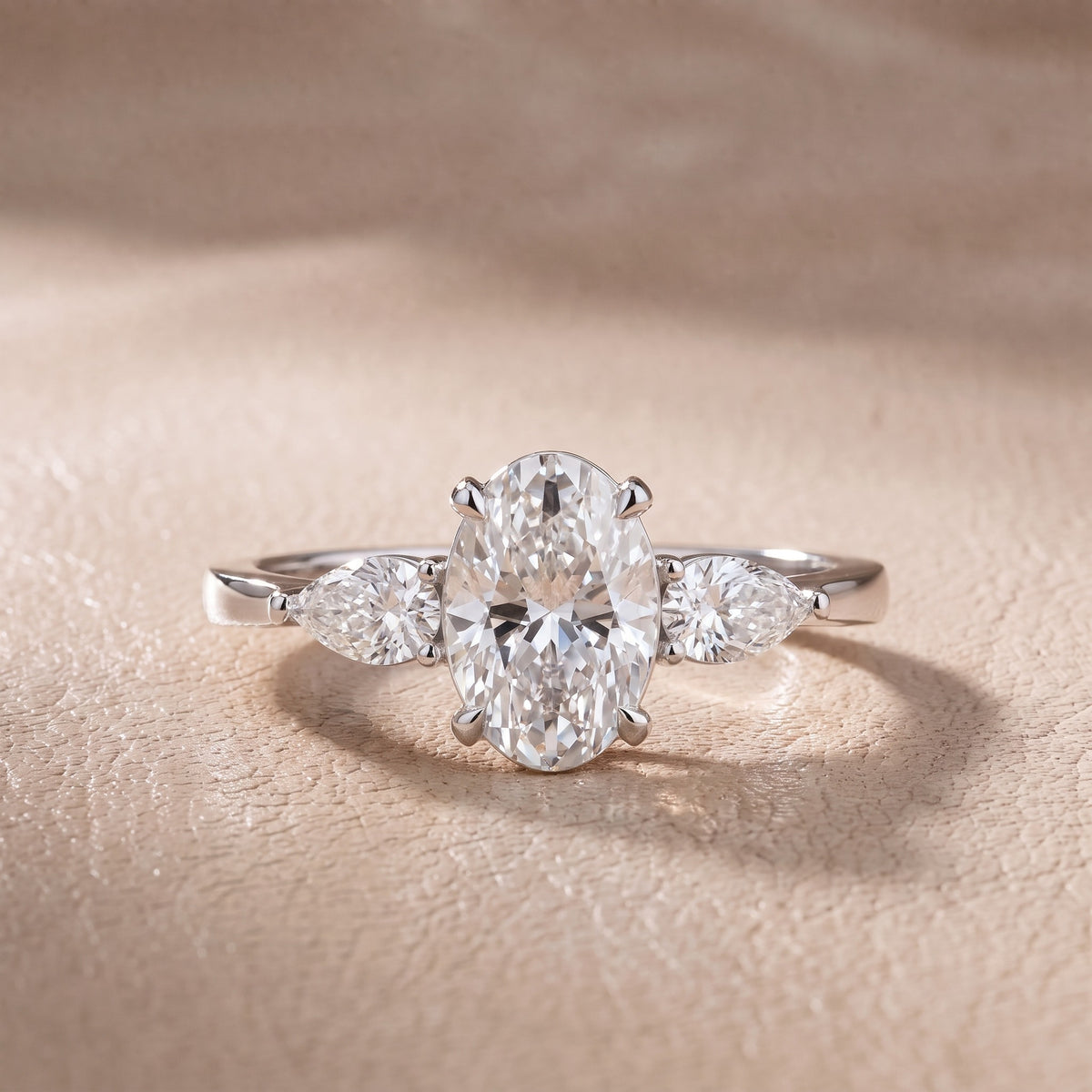 Grace Three Stone Oval Diamond Engagement Ring in White Gold - front.jpg
