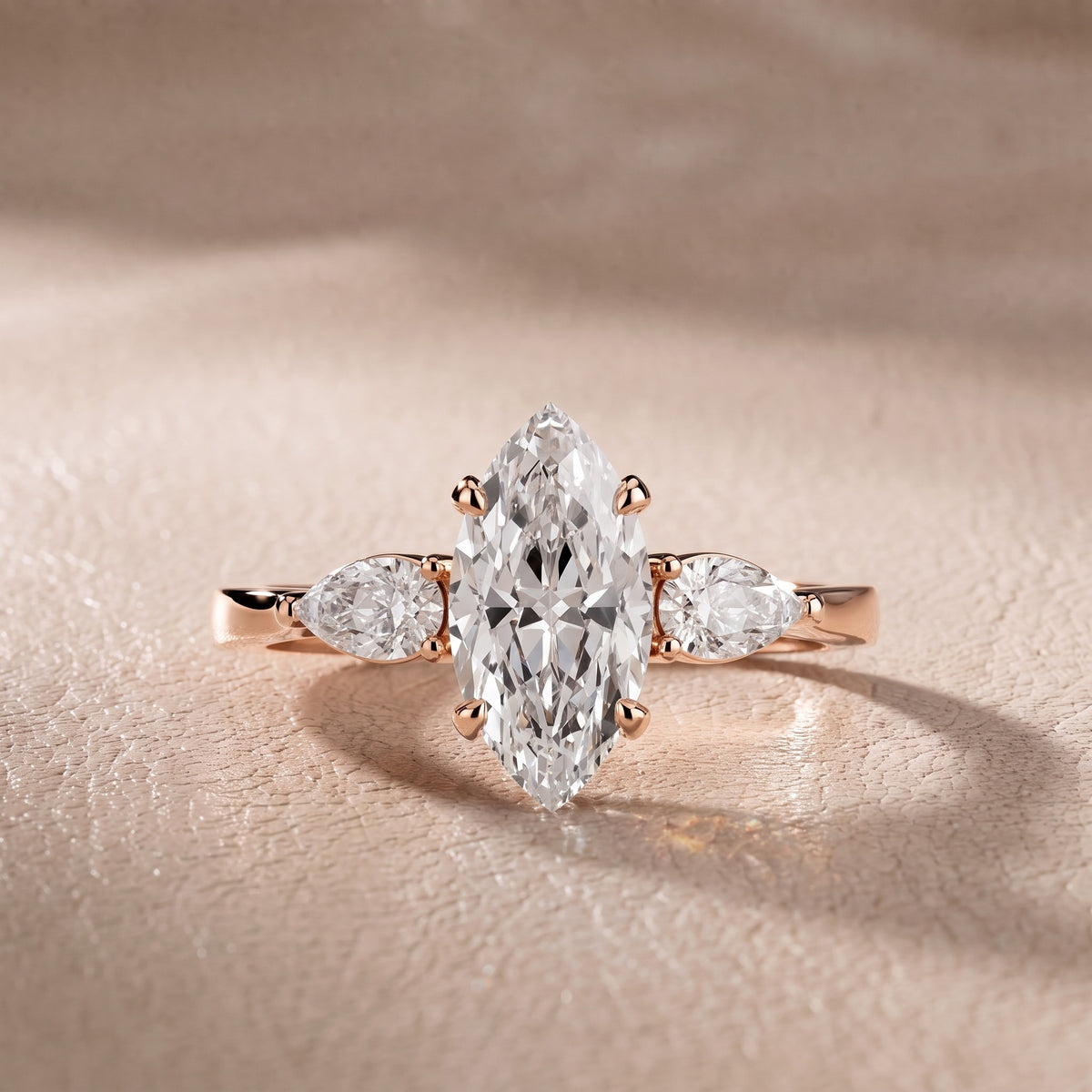 Grace Three Stone Marquise Diamond Engagement Ring in Rose Gold - front.jpg