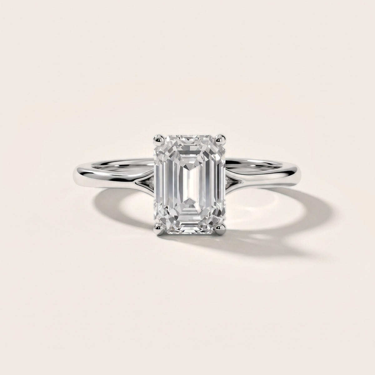 Blanche Solitaire Split Shank Emerald Diamond Engagement Ring in Platinum - front.jpg
