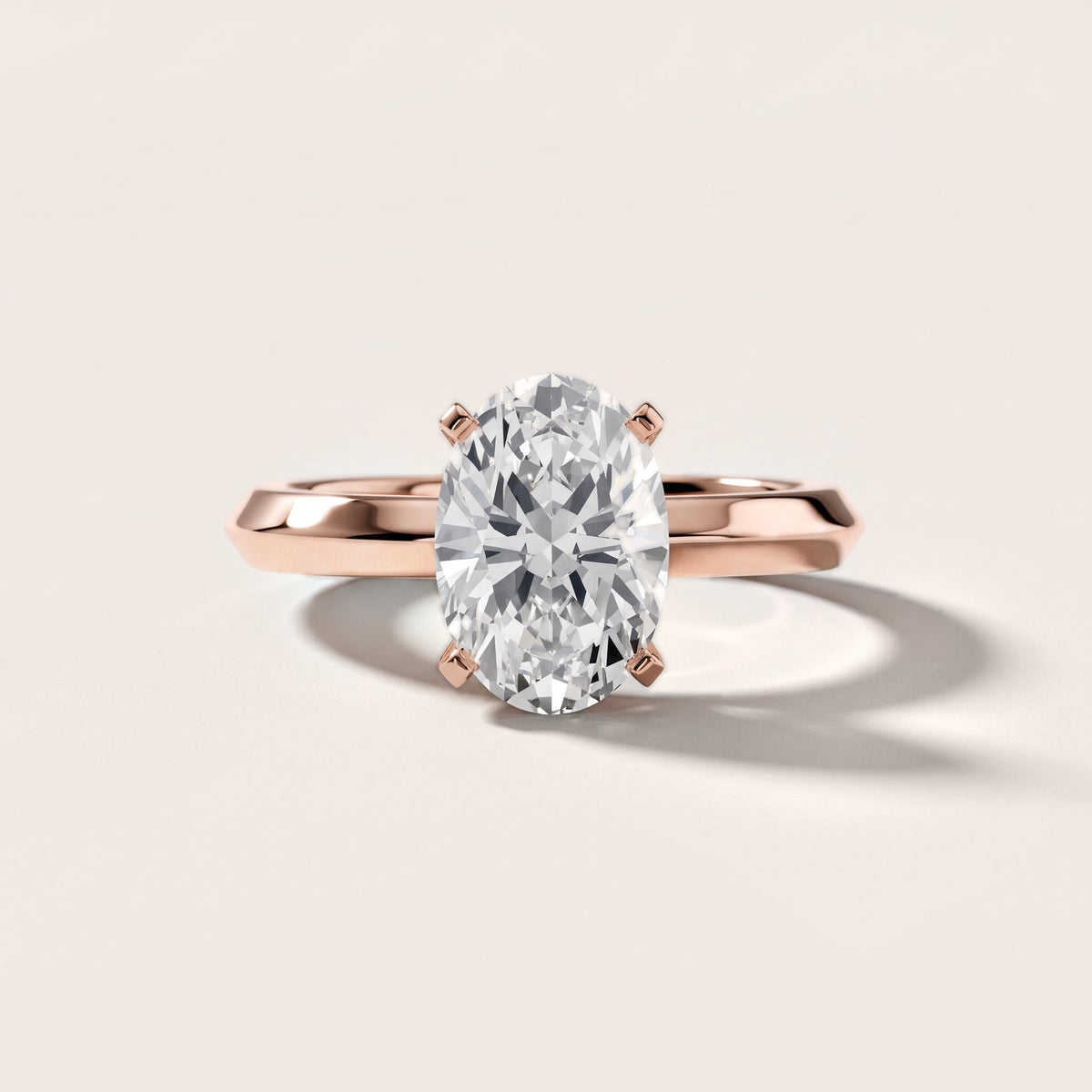 June Solitaire Knife Edge Oval Diamond Engagement Ring in Rose Gold - front.jpg