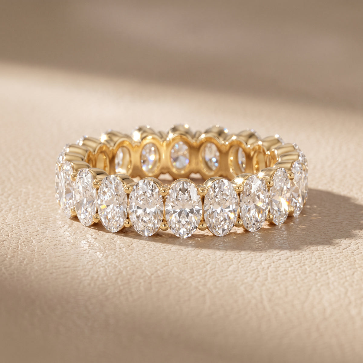 Marlowe Shared Prong Oval Diamond Eternity Band in Yellow Gold - front.jpg