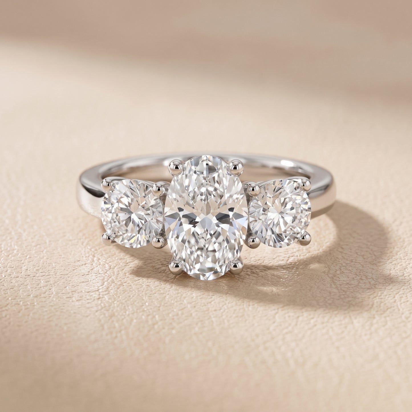 Callie Three-Stone Trellis Oval Diamond Engagement Ring in White Gold - front.jpg