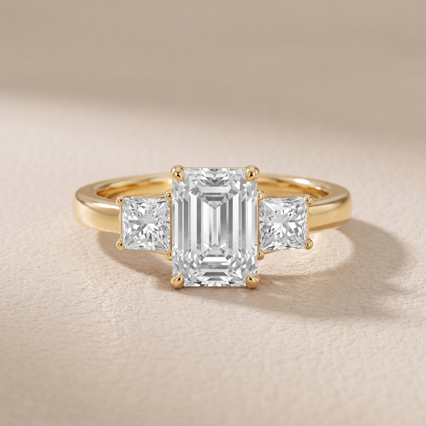 Selena Three-Stone Basket Emerald Diamond Ring in Yellow Gold - front.jpg