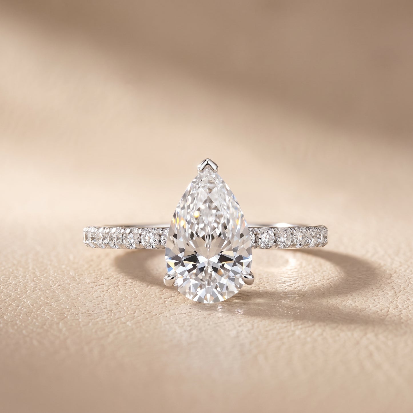 Juna French Pavé Solitaire Pear Diamond Engagement Ring in Silver - front.jpg