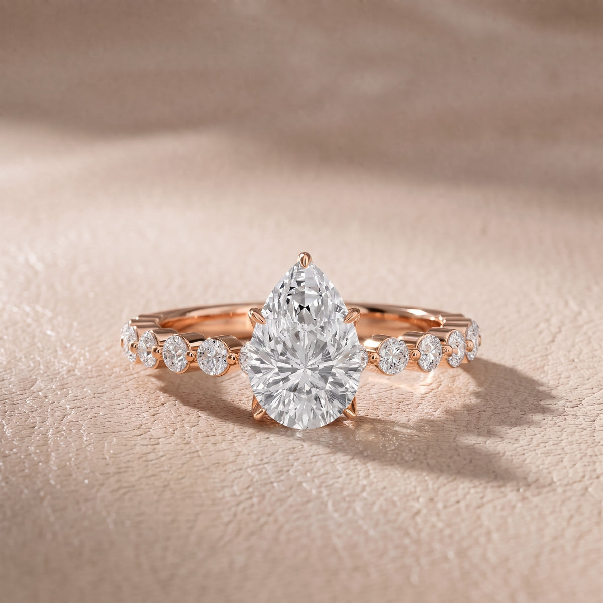 Eleanor Majesty Side Stone Pear Diamond Engagement Ring in Rose Gold - front.jpg