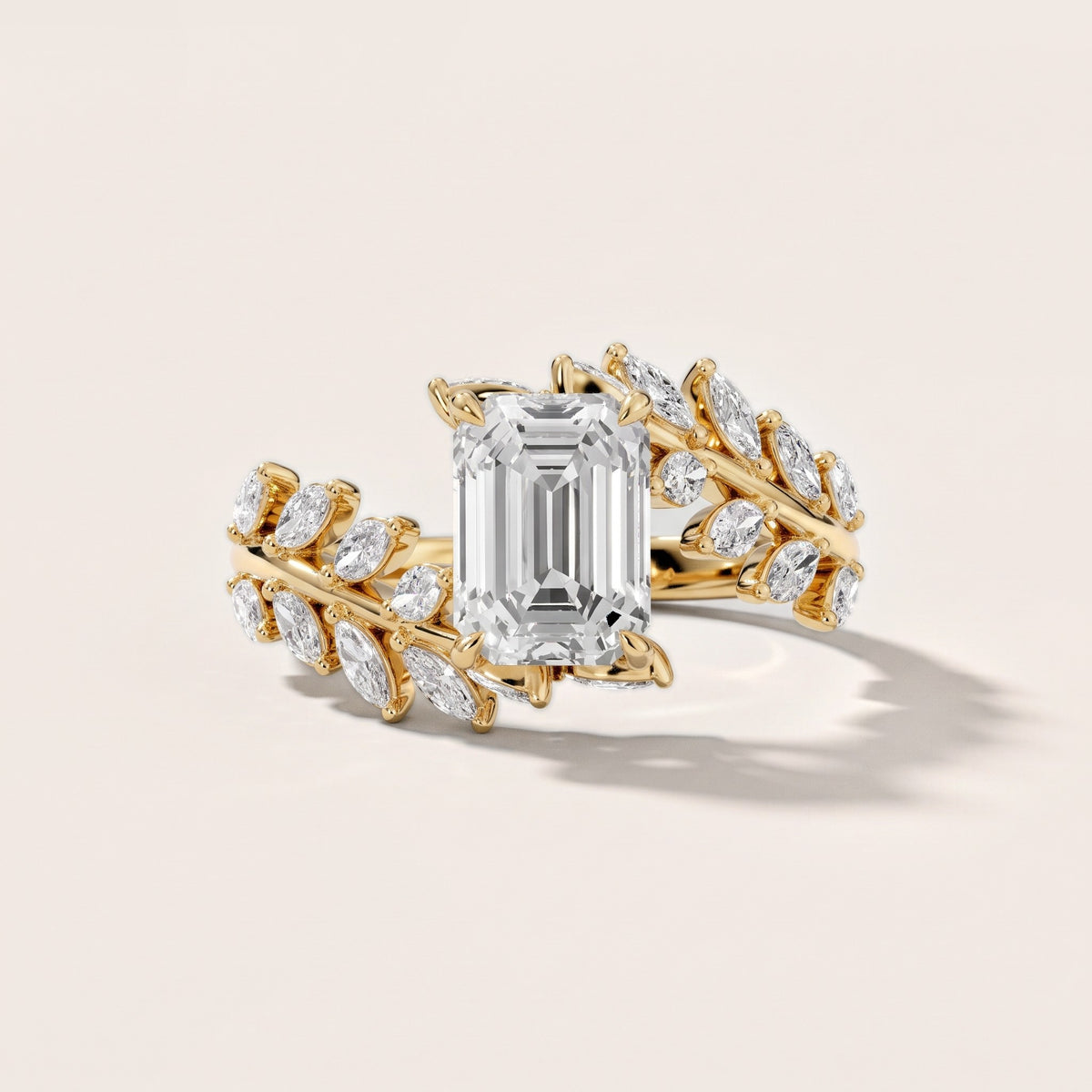 Clarion Leaf Bypass Emerald Diamond Engagement Ring in Yellow Gold - front.jpg