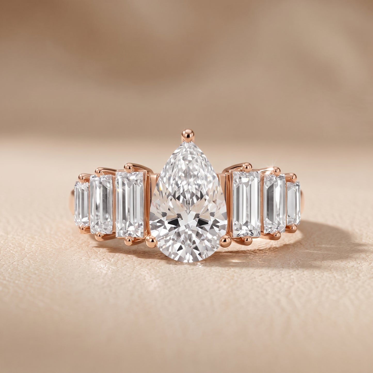 Mara Sidestone Baguette Accent Pear Diamond Engagement Ring in Rose Gold - front.jpg