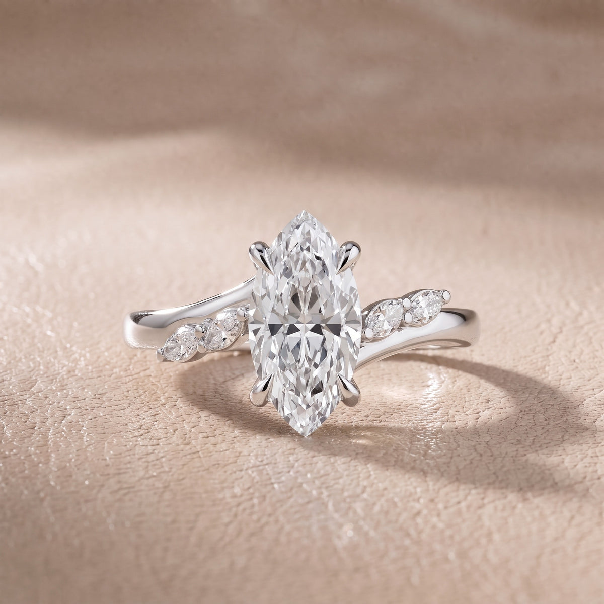Flora Twist Side Stone Marquise Diamond Engagement Ring in Platinum - front.jpg