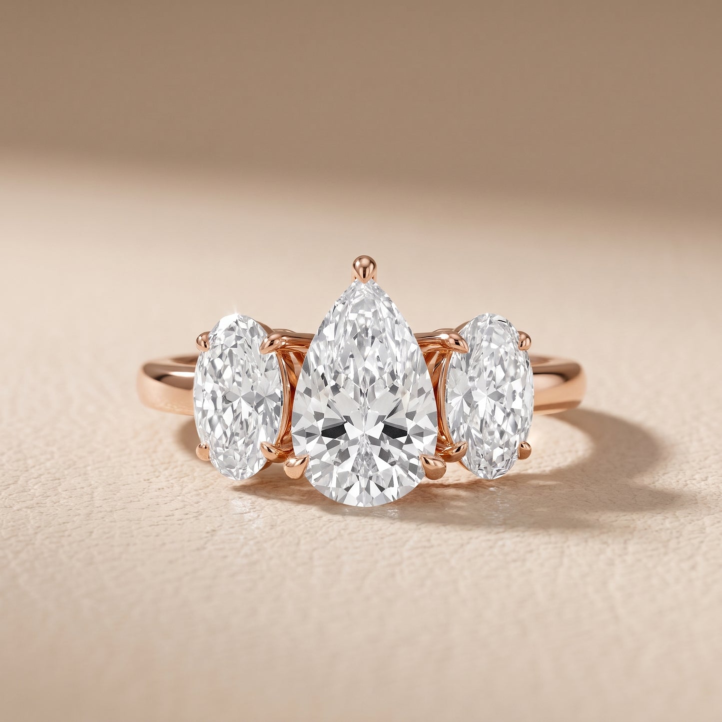 Lila Three-Stone Pear Diamond Ring in Rose Gold - front.jpg