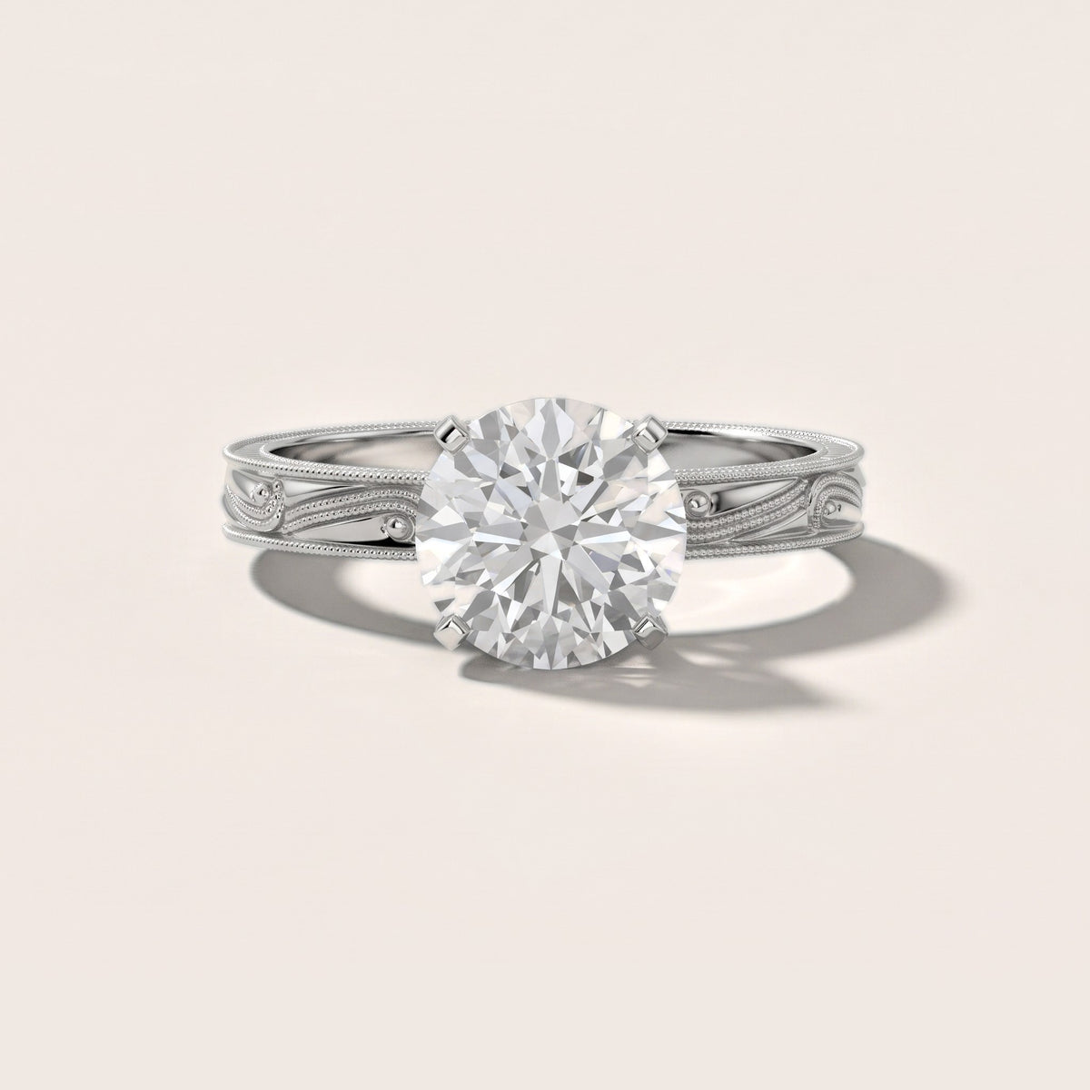 Abbie Engraved Solitaire Round Diamond Engagement Ring in Silver - front.jpg