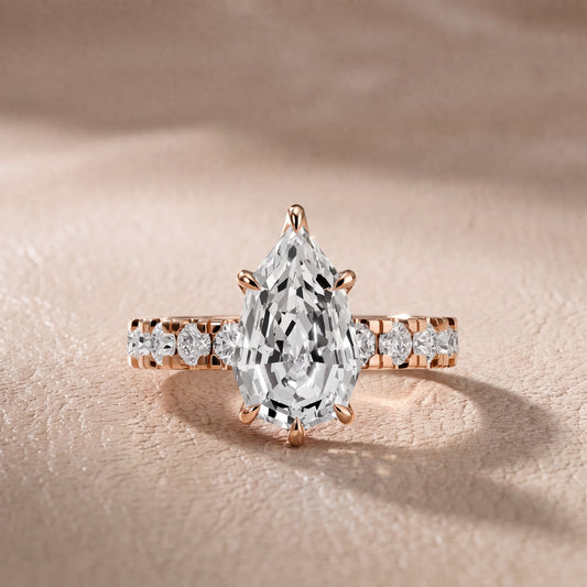 Delaney Hidden Halo French Pavé Step Cut Pear Diamond Engagement Ring in Rose Gold - front.jpg