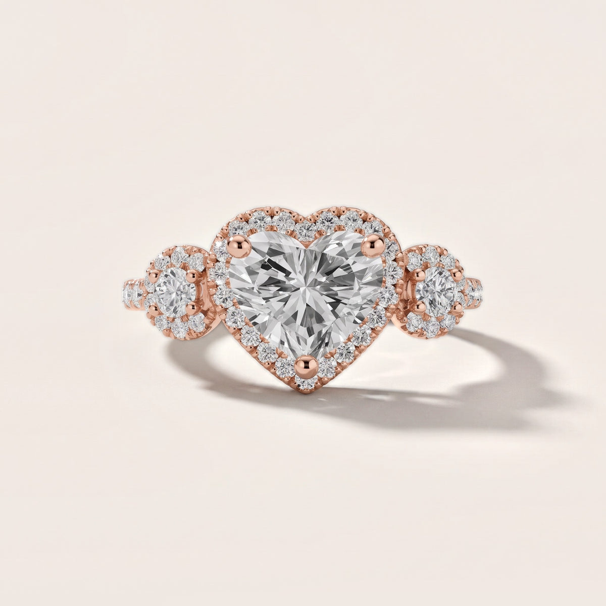 Denver Three-Stone Halo Heart Diamond Engagement Ring in Rose Gold - front.jpg